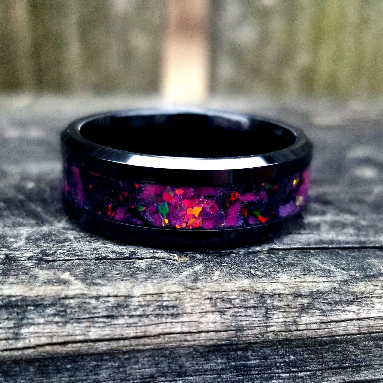 Galaxy opal ring. Black ceramic glow ring with ruby red and black fire opal inlay. Men's ring. Sizes 5-13