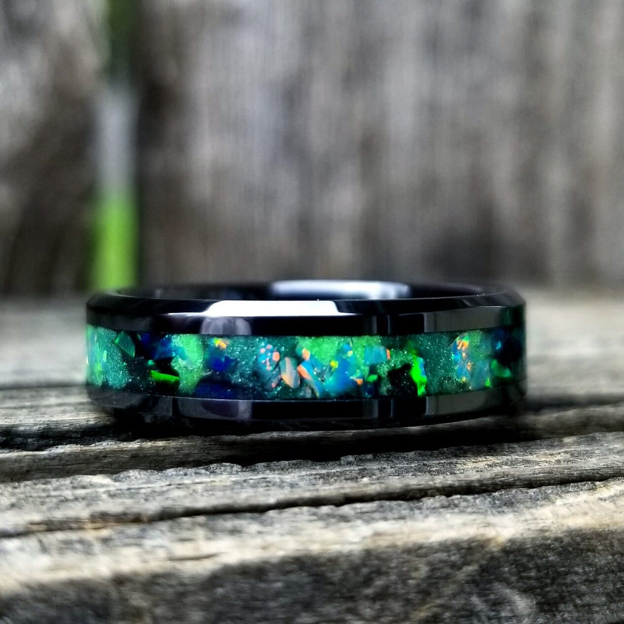 Galaxy opal ring. Black ceramic glow ring with forest green opal and jade fire opal inlay. Men's ring. Sizes 5-13