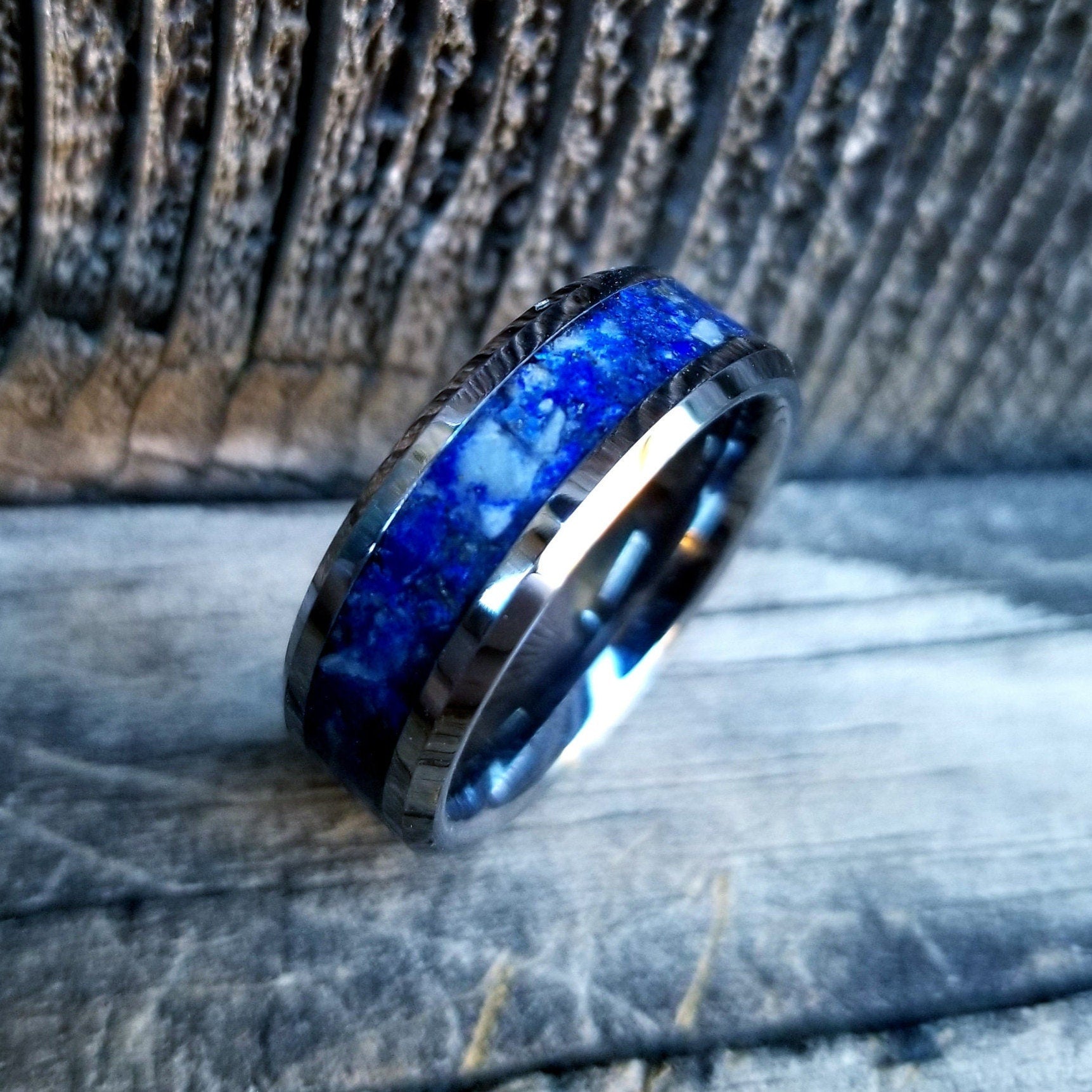 Tungsten carbide ring with lapis lazuli inlay. Crushed lapis lazuli ri ...
