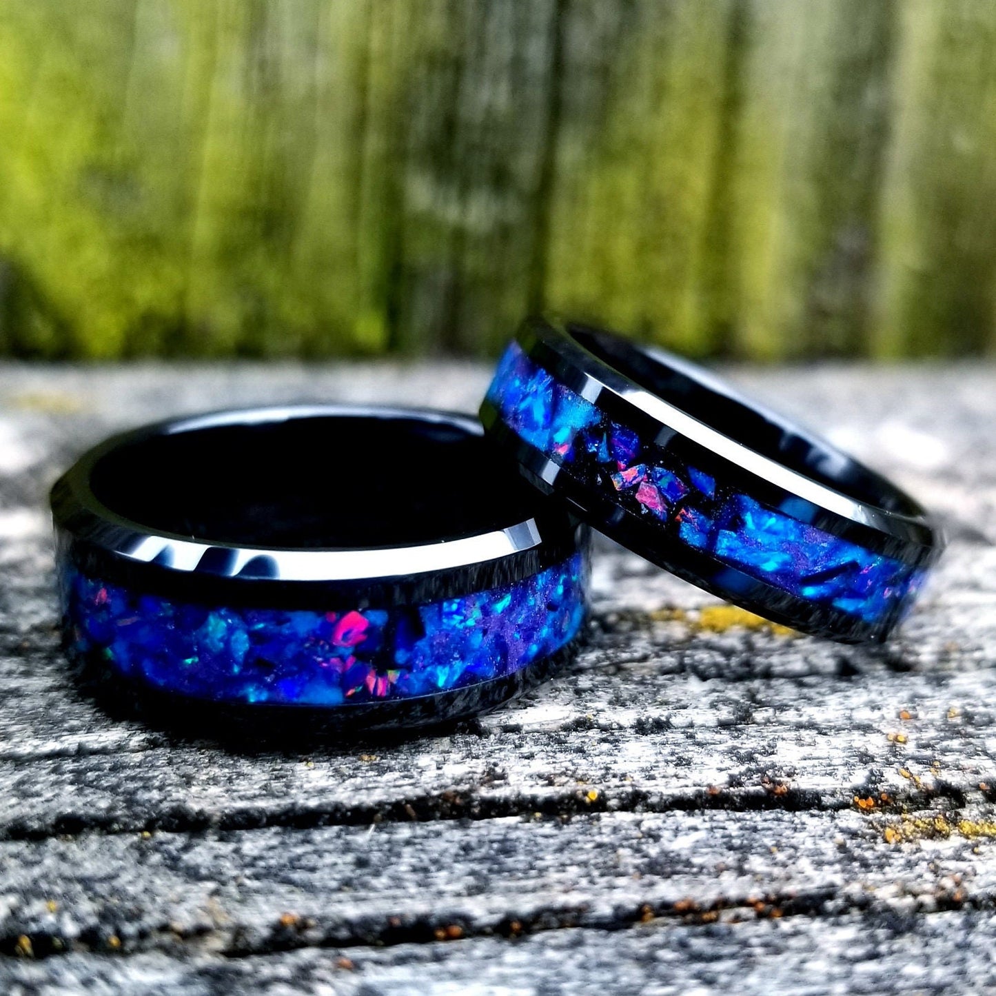 His and Hers wedding ring set. Galaxy fire opal ring. Black ceramic glow ring set with violet opal and blue fire opal inlay. Sizes 5-13